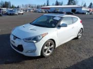✅ 2014 Hyundai Veloster • VIN: KMHTC6AD9EU185928 • Lot: 41720927. Wystawiony na IAAI z przebiegiem 94 023 mil. Bezpłatny archiwum sprzedaży aukcyjnych z USA i szczegółowy raport historii pojazdu na DreamBid. Zdjęcie 2.