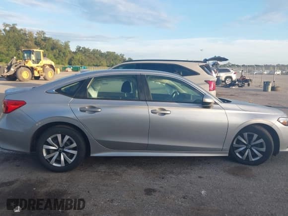 ✅ 2023 Honda Civic LX • VIN: 2HGFE2F20PH534591 • Лот: 43267850. Опубликован ранее на IAAI с пробегом 29 453 миль. Бесплатный доступ к архиву аукционных продаж из США и подробный отчёт об истории автомобиля на DreamBid. Изображение 13.