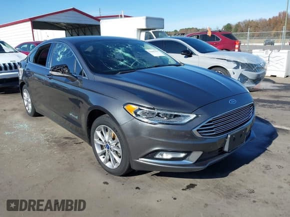 ✅ 2017 Ford Fusion Hybrid SE • VIN: 3FA6P0LU8HR260068 • Lot: 43685195. Listed on IAAI with 211,056 mi. Free auction sales archive from the USA and detailed vehicle history report at DreamBid. Image 1.
