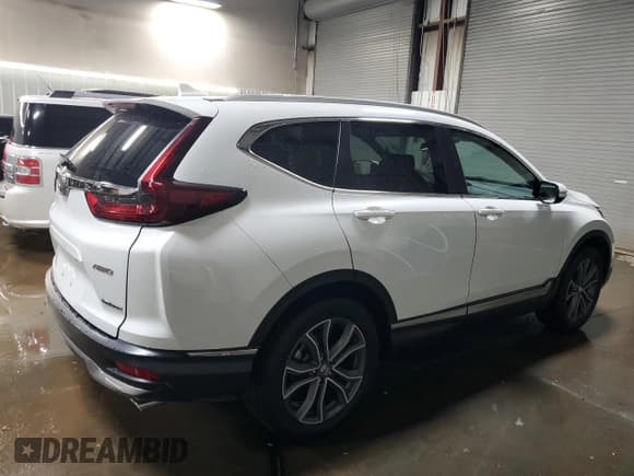 ✅ 2021 Honda CR-V Touring • VIN: 2HKRW2H97MH649971 • Lot: 93375235. Listed on Copart with 100,965 mi. Free auction sales archive from the USA and detailed vehicle history report at DreamBid. Image 3.