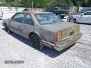 ✅ 1988 Oldsmobile Delta • VIN: 1G3HN14C7JW410839 • Lot: 42691147. Listed on IAAI with 124,911 mi. Free auction sales archive from the USA and detailed vehicle history report at DreamBid. Image 3.