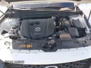 ✅ 2024 Mazda CX-50 S Preferred • VIN: 7MMVABBM3RN219436 • Lot: 43420206. Listed on IAAI with 10,199 mi. Free auction sales archive from the USA and detailed vehicle history report at DreamBid. Image 10.