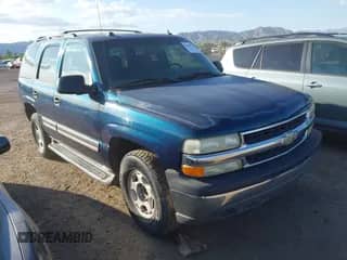 2005 Chevrolet Tahoe LT with VIN 1GNEC13T35R241277, listed as a IAAI auction lot 43305712 with 299,053 mi miles and . Bid and sale history available at DreamBid. Image 1.