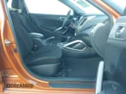 ✅ 2016 Hyundai Veloster • VIN: KMHTC6AD2GU281578 • Lot: 41237574. Wystawiony na IAAI z przebiegiem 128 235 mil. Bezpłatny archiwum sprzedaży aukcyjnych z USA i szczegółowy raport historii pojazdu na DreamBid. Zdjęcie 5.