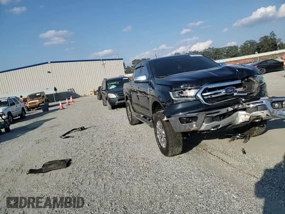 ✅ 2020 Ford Ranger Lariat • VIN: 1FTER4FHXLLA46986 • Lot: 82096795. Wystawiony na Copart z przebiegiem 116 413 mil. Bezpłatny archiwum sprzedaży aukcyjnych z USA i szczegółowy raport historii pojazdu na DreamBid. Zdjęcie 14.