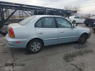 2004 Hyundai Accent GL z VIN KMHCG45C34U567915, wystawiony jako Copart lot #43654985 z przebiegiem 141 461 mil mil oraz Czysty tytuł • Clean title. Historia ofert i sprzedaży dostępna na DreamBid. Obrazek 3.