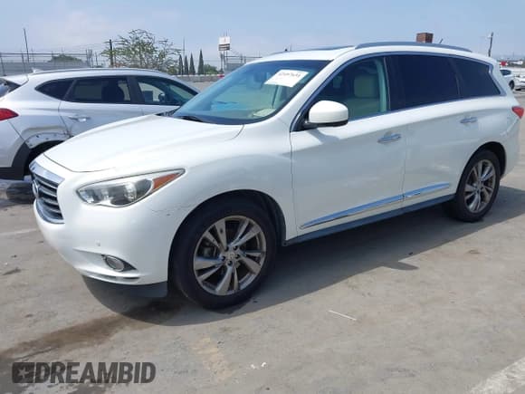 ✅ 2013 Infiniti JX35 • VIN: 5N1AL0MM0DC308522 • Lot: 42497631. Listed on IAAI with 181,935 mi. Free auction sales archive from the USA and detailed vehicle history report at DreamBid. Image 17.
