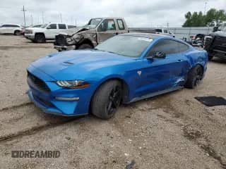 2021 Ford Mustang EcoBoost with VIN 1FA6P8THXM5128654, listed as a Copart auction lot 66044175 with 67,923 mi miles and Salvage title. Bid and sale history available at DreamBid. Image 1.