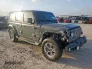 ✅ 2022 Jeep Wrangler Unlimited Sahara • VIN: 1C4HJXEG8NW164969 • Lot: 61671095. Listed on Copart with 64,263 mi. Free auction sales archive from the USA and detailed vehicle history report at DreamBid. Image 4.
