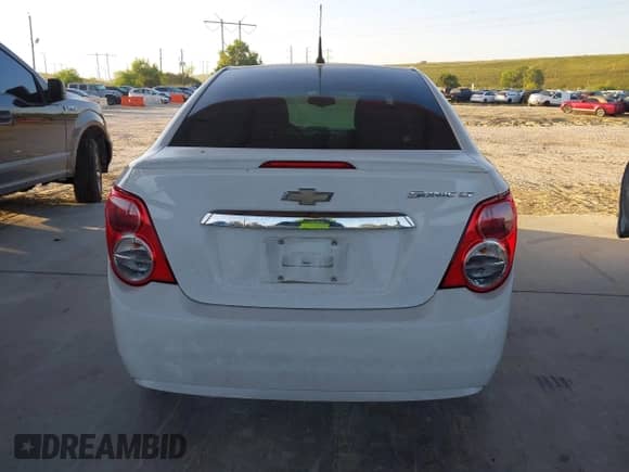 2014 Chevrolet Sonic LT with VIN 1G1JC5SG9E4127762, listed as a IAAI auction lot 43521388 with 128,333 mi miles and . Bid and sale history available at DreamBid. Image 16.