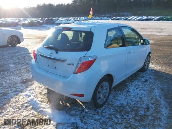 ✅ 2012 Toyota Yaris L • VIN: JTDJTUD37CD503738 • Lot: 41340555. Listed on IAAI with 52,128 mi. Free auction sales archive from the USA and detailed vehicle history report at DreamBid. Image 4.