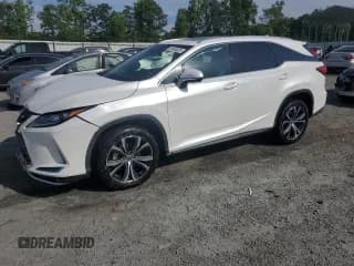 ✅ 2021 Lexus RX 350L • VIN: JTJHZKFA6M2028946 • Лот: 61445525. Опубликован ранее на Copart с пробегом 60 641 миль. Бесплатный доступ к архиву аукционных продаж из США и подробный отчёт об истории автомобиля на DreamBid. Изображение 1.