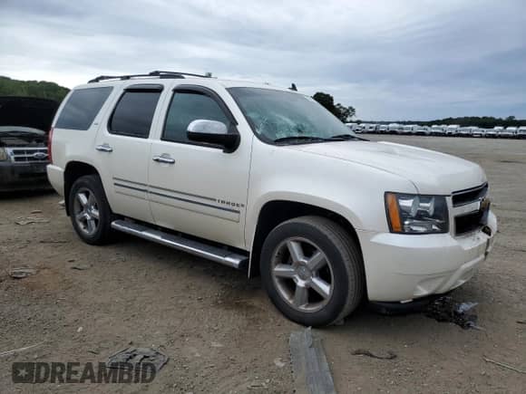 2013 Chevrolet Tahoe LTZ с VIN 1GNSKCE01DR267797, выставлен на аукционе Copart как лот 66854655 с пробегом 119 588 миль миль и Чистый • Clean title. История ставок и продаж доступна на DreamBid. Изображение 4.