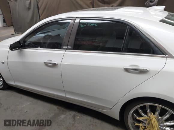 ✅ 2015 Cadillac CTS Luxury AWD • VIN: 1G6AX5SX2F0128856 • Lot: 42964622. Listed on IAAI with 117,061 mi. Free auction sales archive from the USA and detailed vehicle history report at DreamBid. Image 14.