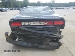 ✅ 2013 Dodge Challenger SXT • VIN: 2C3CDYAG7DH592935 • Lot: 84277125. Wystawiony na Copart z przebiegiem 204 885 mil. Bezpłatny archiwum sprzedaży aukcyjnych z USA i szczegółowy raport historii pojazdu na DreamBid. Zdjęcie 6.