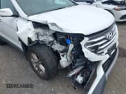 ✅ 2018 Hyundai Santa Fe 2.4L • VIN: 5XYZU3LB4JG566054 • Лот: 42918543. Опубликован ранее на IAAI с пробегом 95 595 миль. Бесплатный доступ к архиву аукционных продаж из США и подробный отчёт об истории автомобиля на DreamBid. Изображение 6.