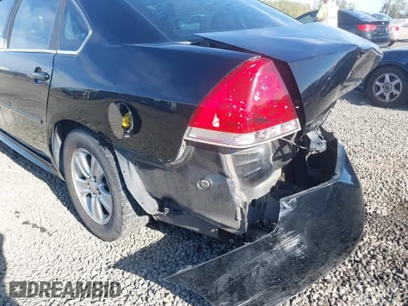 ✅ 2014 Chevrolet Impala LS • VIN: 2G1WA5E33E1140331 • Lot: 43507195. Listed on IAAI with 102,299 mi. Free auction sales archive from the USA and detailed vehicle history report at DreamBid. Image 17.