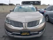 ✅ 2018 Lincoln MKX Select • VIN: 2LMPJ6KR0JBL14757 • Lot: 43341571. Listed on IAAI with 106,923 mi. Free auction sales archive from the USA and detailed vehicle history report at DreamBid. Image 13.