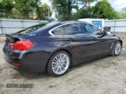 ✅ 2015 BMW 4 Series 428i • VIN: WBA4A5C5XFGK15496 • Lot: 57025085. Listed on Copart with 154,616 mi. Free auction sales archive from the USA and detailed vehicle history report at DreamBid. Image 3.