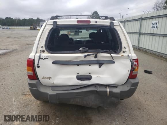 ✅ 2000 Jeep Grand Cherokee Laredo • VIN: 1J4G248S1YC229104 • Лот: 62478135. Опубликован ранее на Copart с пробегом 142 443 миль. Бесплатный доступ к архиву аукционных продаж из США и подробный отчёт об истории автомобиля на DreamBid. Изображение 6.