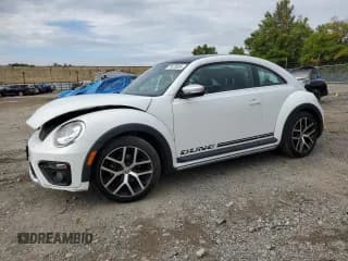 ✅ 2018 Volkswagen Beetle Dune • VIN: 3VWSD7AT1JM706856 • Lot: 71675824. Wystawiony na Copart z przebiegiem 119 451 mil. Bezpłatny archiwum sprzedaży aukcyjnych z USA i szczegółowy raport historii pojazdu na DreamBid. Zdjęcie 1.