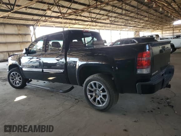 ✅ 2007 GMC Sierra Denali • VIN: 2GTEK638571681579 • Lot: 57000965. Listed on Copart with 165,724 mi. Free auction sales archive from the USA and detailed vehicle history report at DreamBid. Image 2.