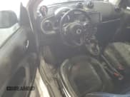 ✅ 2016 Smart fortwo Prime • VIN: WMEFJ5DA9GK053514 • Lot: 61554565. Wystawiony na Copart z przebiegiem 85 779 mil. Bezpłatny archiwum sprzedaży aukcyjnych z USA i szczegółowy raport historii pojazdu na DreamBid. Zdjęcie 8.