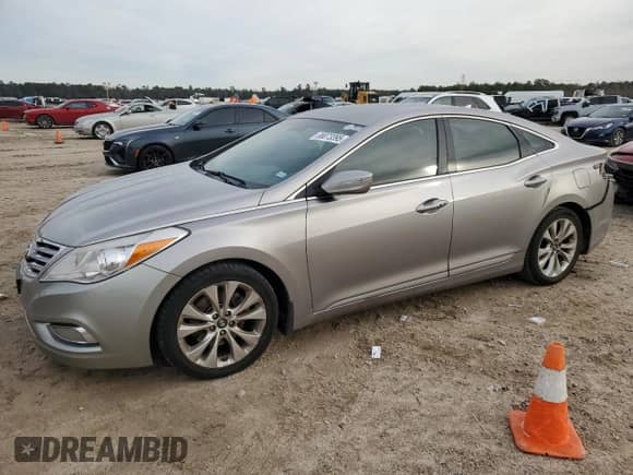 2012 Hyundai Azera с VIN KMHFG4JG7CA185540, выставлен на аукционе Copart как лот 88073395 с пробегом 177 746 миль миль и Списание • Salvage title. История ставок и продаж доступна на DreamBid. Изображение 1.