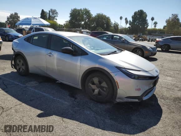 2024 Toyota Prius SE с VIN JTDACACU8R3014689, выставлен на аукционе Copart как лот 85173005 с пробегом 30 579 миль миль и Списание • Salvage title. История ставок и продаж доступна на DreamBid. Изображение 4.