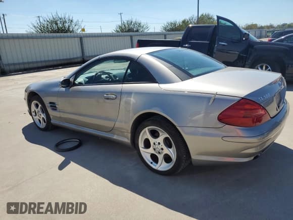 ✅ 2005 Mercedes-Benz SL 500 • VIN: WDBSK75F45F098073 • Лот: 73401994. Опубликован ранее на Copart с пробегом 83 860 миль. Бесплатный доступ к архиву аукционных продаж из США и подробный отчёт об истории автомобиля на DreamBid. Изображение 2.