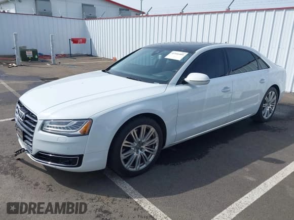 ✅ 2015 Audi A8 4.0T • VIN: WAU32AFD6FN039739 • Lot: 41946401. Wystawiony na IAAI z przebiegiem 102 668 mil. Bezpłatny archiwum sprzedaży aukcyjnych z USA i szczegółowy raport historii pojazdu na DreamBid. Zdjęcie 2.
