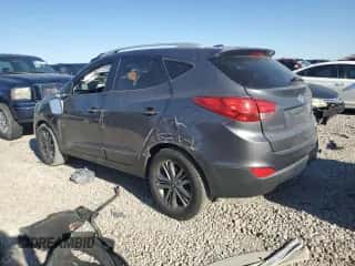 2015 Hyundai Tucson SE z VIN KM8JUCAG8FU007653, wystawiony jako Copart lot #69103044 z przebiegiem 143 509 mil mil oraz Szkoda całkowita • Salvage title. Historia ofert i sprzedaży dostępna na DreamBid. Obrazek 2.
