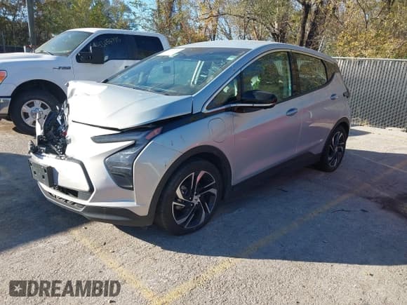 ✅ 2023 Chevrolet Bolt EV 2LT • VIN: 1G1FX6S08P4143599 • Lot: 43648957. Listed on IAAI with 99,625 mi. Free auction sales archive from the USA and detailed vehicle history report at DreamBid. Image 2.