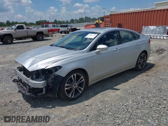 ✅ 2019 Ford Fusion Titanium • VIN: 3FA6P0K94KR253669 • Лот: 42861475. Опубликован ранее на IAAI с пробегом 88 617 миль. Бесплатный доступ к архиву аукционных продаж из США и подробный отчёт об истории автомобиля на DreamBid. Изображение 2.