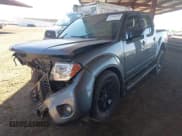 ✅ 2021 Nissan Frontier SV • VIN: 1N6ED0EA8MN711933 • Lot: 42843074. Listed on IAAI with 60,646 mi. Free auction sales archive from the USA and detailed vehicle history report at DreamBid. Image 17.