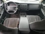 ✅ 2004 Dodge Dakota Sport • VIN: 1D7HG38N84S525629 • Lot: 82140054. Wystawiony na Copart z przebiegiem 255 160 mil. Bezpłatny archiwum sprzedaży aukcyjnych z USA i szczegółowy raport historii pojazdu na DreamBid. Zdjęcie 8.