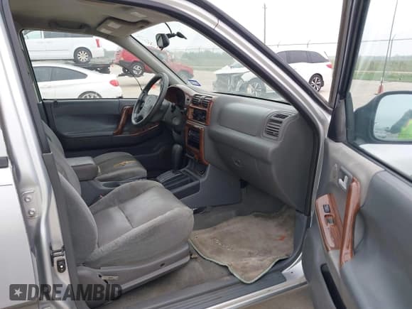 ✅ 2000 Isuzu Rodeo S • VIN: 4S2CK58W3Y4308219 • Lot: 41939765. Listed on IAAI with 241,486 mi. Free auction sales archive from the USA and detailed vehicle history report at DreamBid. Image 5.