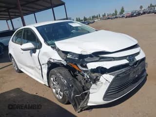 ✅ 2023 Toyota Corolla Hybrid LE • VIN: JTDBCMFE2PJ010348 • Lot: 42933541. Wystawiony na IAAI z przebiegiem 17 977 mil. Bezpłatny archiwum sprzedaży aukcyjnych z USA i szczegółowy raport historii pojazdu na DreamBid. Zdjęcie 1.