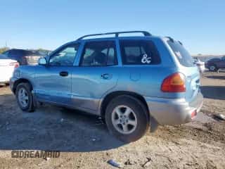 2004 Hyundai Santa Fe with VIN KM8SB12B64U826594, listed as a Copart auction lot 90612545 with 101,208 mi miles and Salvage title. Bid and sale history available at DreamBid. Image 2.