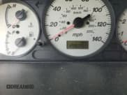 ✅ 2002 Mazda Protege DX • VIN: JM1BJ225721584923 • Лот: 82630595. Опубликован ранее на Copart с пробегом 179 288 миль. Бесплатный доступ к архиву аукционных продаж из США и подробный отчёт об истории автомобиля на DreamBid. Изображение 9.