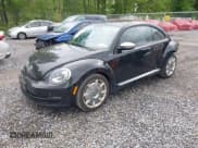 ✅ 2013 Volkswagen Beetle Fender Edition • VIN: 3VWJP7AT6DM687633 • Lot: 42368984. Listed on IAAI with 137,459 mi. Free auction sales archive from the USA and detailed vehicle history report at DreamBid. Image 17.