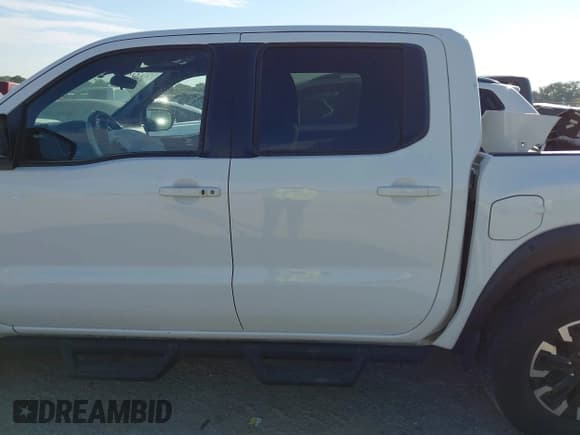 ✅ 2023 Nissan Frontier Pro-4X • VIN: 1N6ED1EKXPN662561 • Lot: 43432334. Listed on IAAI with 73,303 mi. Free auction sales archive from the USA and detailed vehicle history report at DreamBid. Image 14.