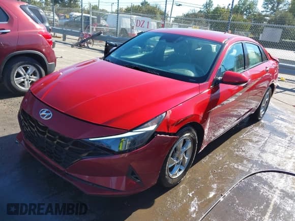 ✅ 2021 Hyundai Elantra SE • VIN: KMHLL4AG1MU071872 • Lot: 43457624. Listed on IAAI with 63,154 mi. Free auction sales archive from the USA and detailed vehicle history report at DreamBid. Image 2.