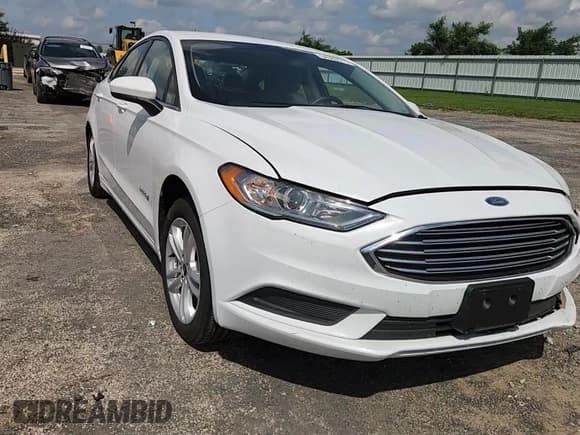✅ 2018 Ford Fusion S • VIN: 3FA6P0UU0JR122349 • Lot: 64980515. Listed on Copart with 101,298 mi. Free auction sales archive from the USA and detailed vehicle history report at DreamBid. Image 14.