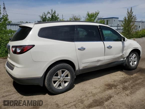 ✅ 2013 Chevrolet Traverse LT • VIN: 1GNKRGKDXDJ256810 • Lot: 57332035. Listed on Copart with 128,990 mi. Free auction sales archive from the USA and detailed vehicle history report at DreamBid. Image 3.
