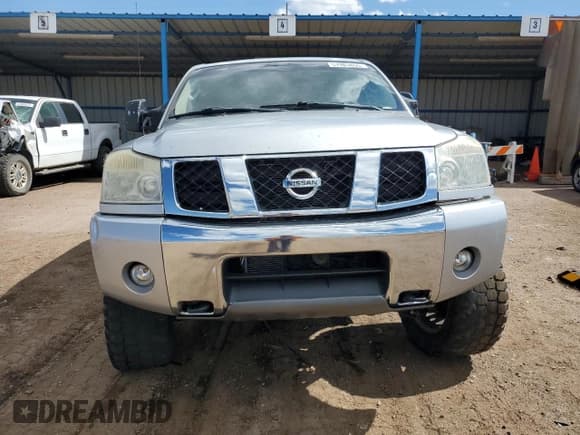 ✅ 2005 Nissan Titan LE • VIN: 1N6AA07B75N562624 • Лот: 57983455. Опубликован ранее на Copart с пробегом 262 135 миль. Бесплатный доступ к архиву аукционных продаж из США и подробный отчёт об истории автомобиля на DreamBid. Изображение 5.
