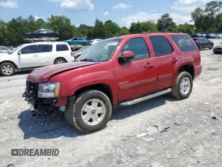 2014 Chevrolet Tahoe LT z VIN 1GNSCBE06ER117340, wystawiony jako Copart lot #69040115 z przebiegiem 69 592 mil mil oraz Szkoda całkowita • Salvage title. Historia ofert i sprzedaży dostępna na DreamBid. Obrazek 1.