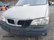 ✅ 2000 Pontiac Montana • VIN: 1GMDX03EXYD108954 • Lot: 41490245. Wystawiony na IAAI z przebiegiem 173 781 mil. Bezpłatny archiwum sprzedaży aukcyjnych z USA i szczegółowy raport historii pojazdu na DreamBid. Zdjęcie 6.