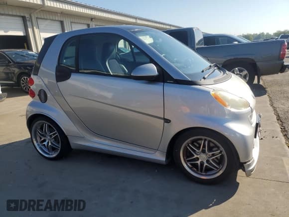 ✅ 2009 Smart fortwo Pure • VIN: WMEEJ31X19K300679 • Lot: 67976825. Listed on Copart with 69,660 mi. Free auction sales archive from the USA and detailed vehicle history report at DreamBid. Image 4.