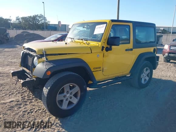 ✅ 2015 Jeep Wrangler Sport • VIN: 1C4AJWAG4FL542631 • Lot: 43701197. Listed on IAAI with 166,531 mi. Free auction sales archive from the USA and detailed vehicle history report at DreamBid. Image 2.